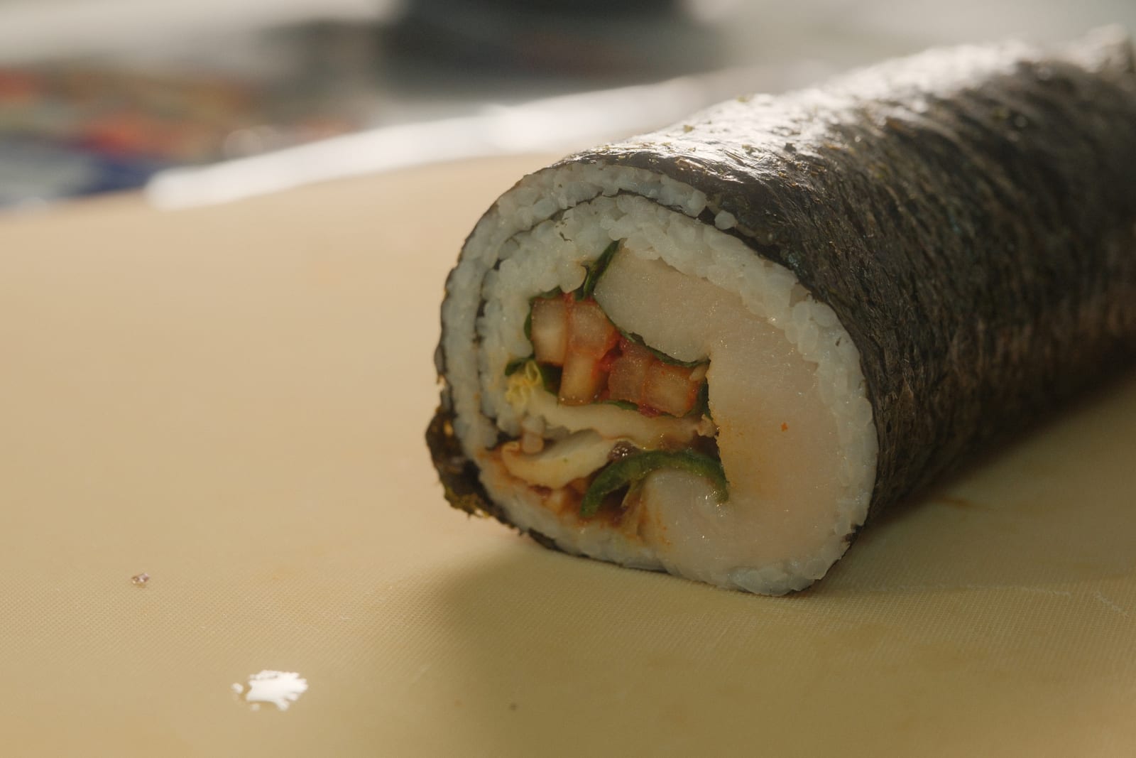 Cross-section of a finished bossam gimbap roll