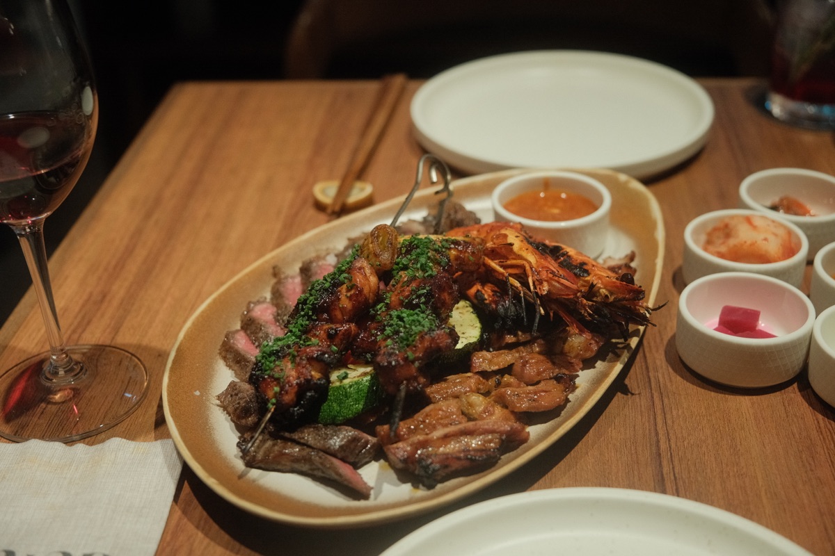 GU:UM charcoal platter with glazed dalkkochi, Hanwoo, pork collar, tiger prawns and vegetables