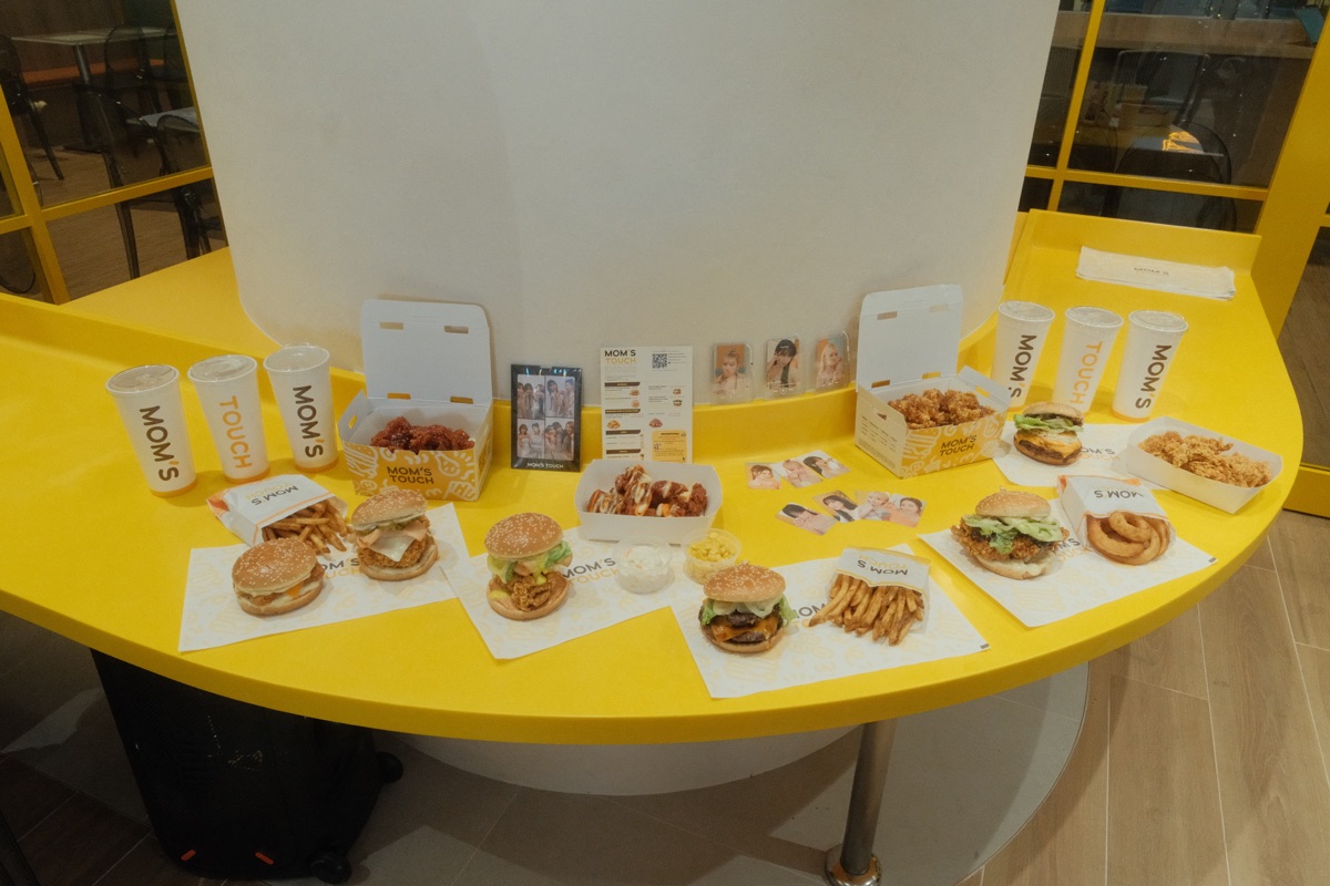 Mom's Touch Singapore menu spread with burgers, chicken, fries and drinks