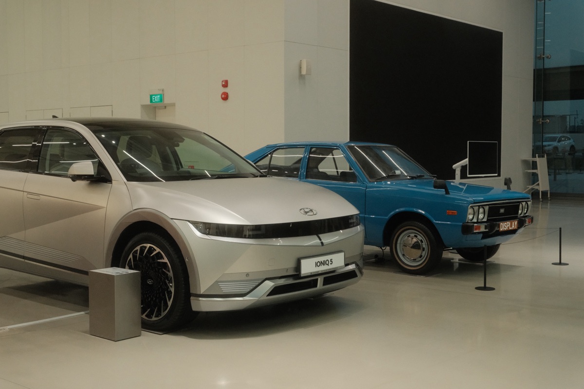 Hyundai IONIQ 5 and vintage Pony at HMGICS showroom